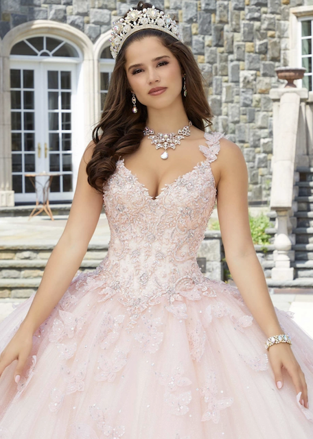 Model wearing a Quinceañera dress Aurora Disney Dress